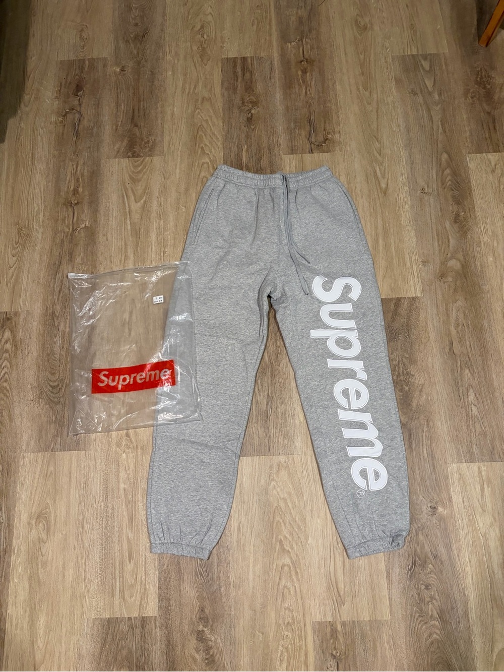 Supreme Grey Kids Logo Joggers with White Vertical Branding